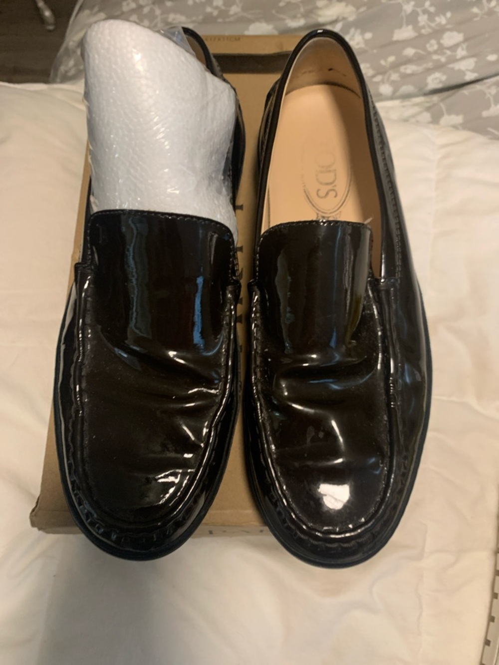 Tod,s women Glossy Black Patent Slip-On Loafers